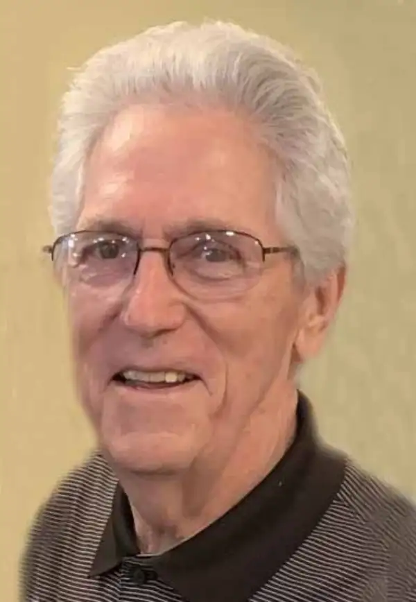 Larry E. "Slick" Woods